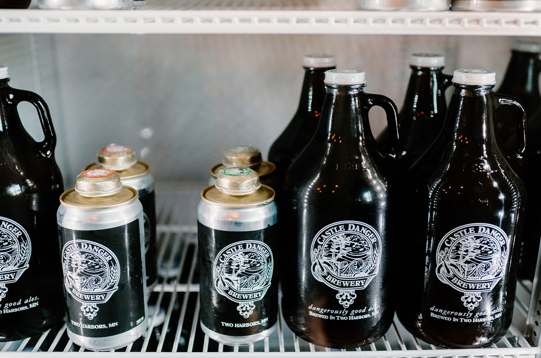 Growlers and crowlers in a cooler.